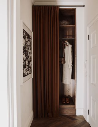 Chocolate brown curtain covering closet