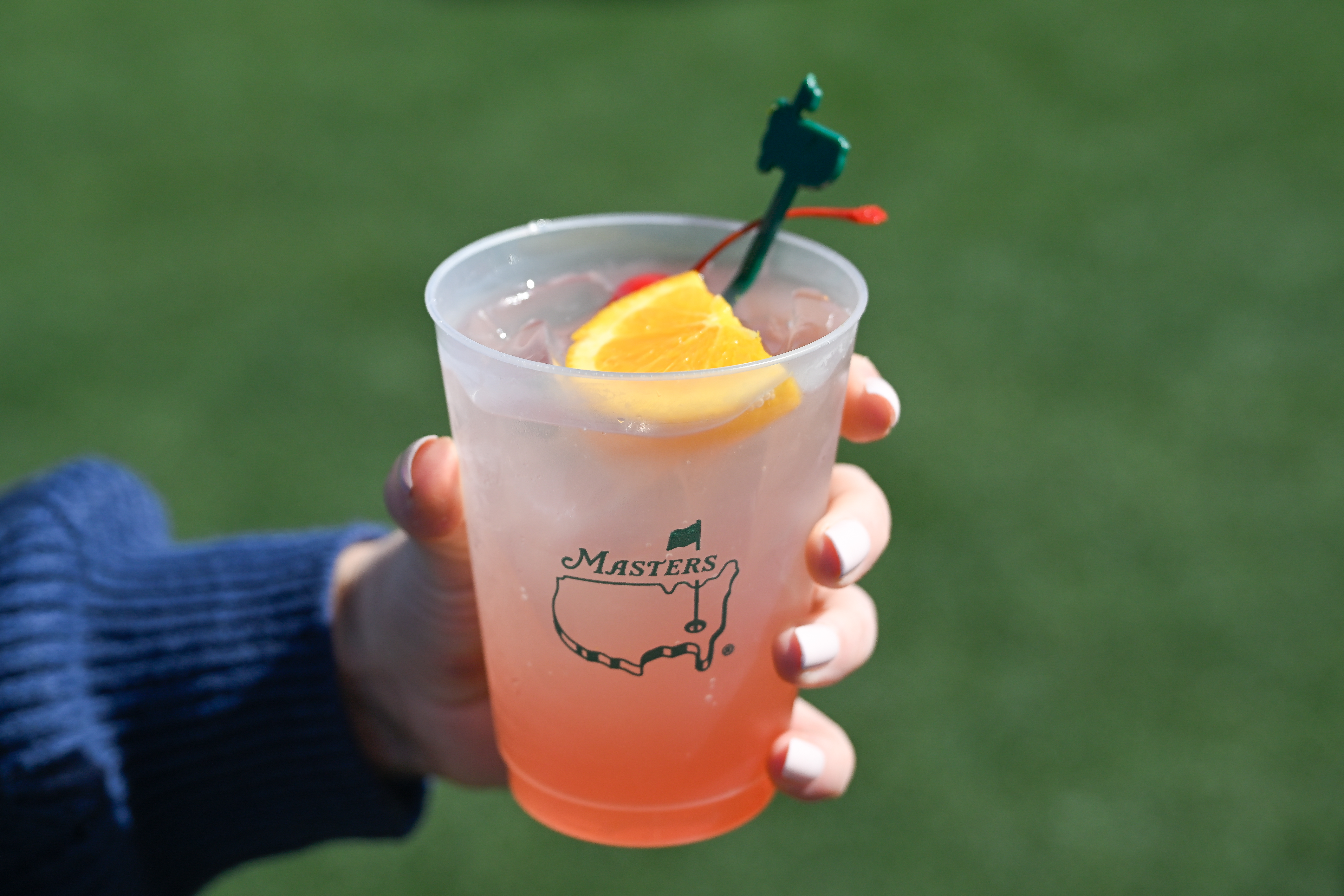 An Azalea cocktail seen in-hand during The Masters
