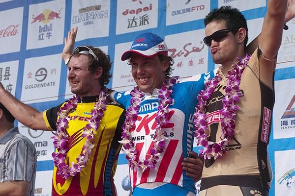 Some Chinese floral wear for the final stage placegetters (L-R): Sergey Kudentsov (Polygon Sweetnice), Kenny Van Hummel (Skil-Shimano), and Enrique Mata (Footon Servetto).