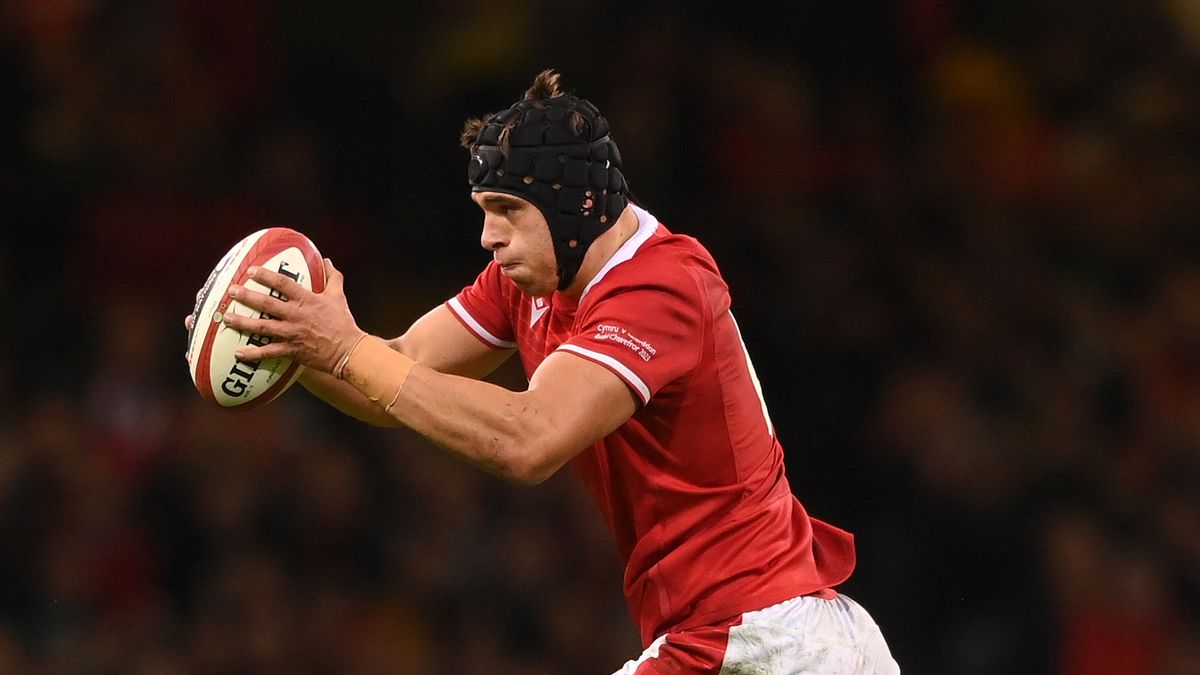 Wales captain Dafydd Jenkins runs with the ball ahead of the Wales vs Scotland Six Nations 2024 match