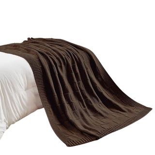 A brown checkered blanket on a white duvet insert