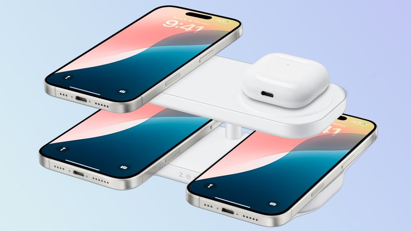 Zens Quattro Wireless Charging Pro 4 charging station with 3 iphones and an AirPods case