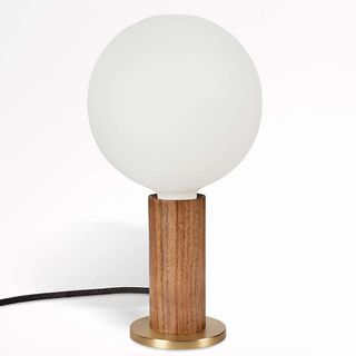 A globe bedside lamp