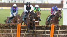 CHELTENHAM, ENGLAND - MARCH 17: Danny Mullins (black and white kit) on Flooring Porter clear the last to win The Paddy Power Stayers&rsquo; Hurdle race during day three of The Cheltenham Festival 2022 at Cheltenham Racecourse on March 17, 2022 in Cheltenham, England. (Photo by Alan Crowhurst/Getty Images)