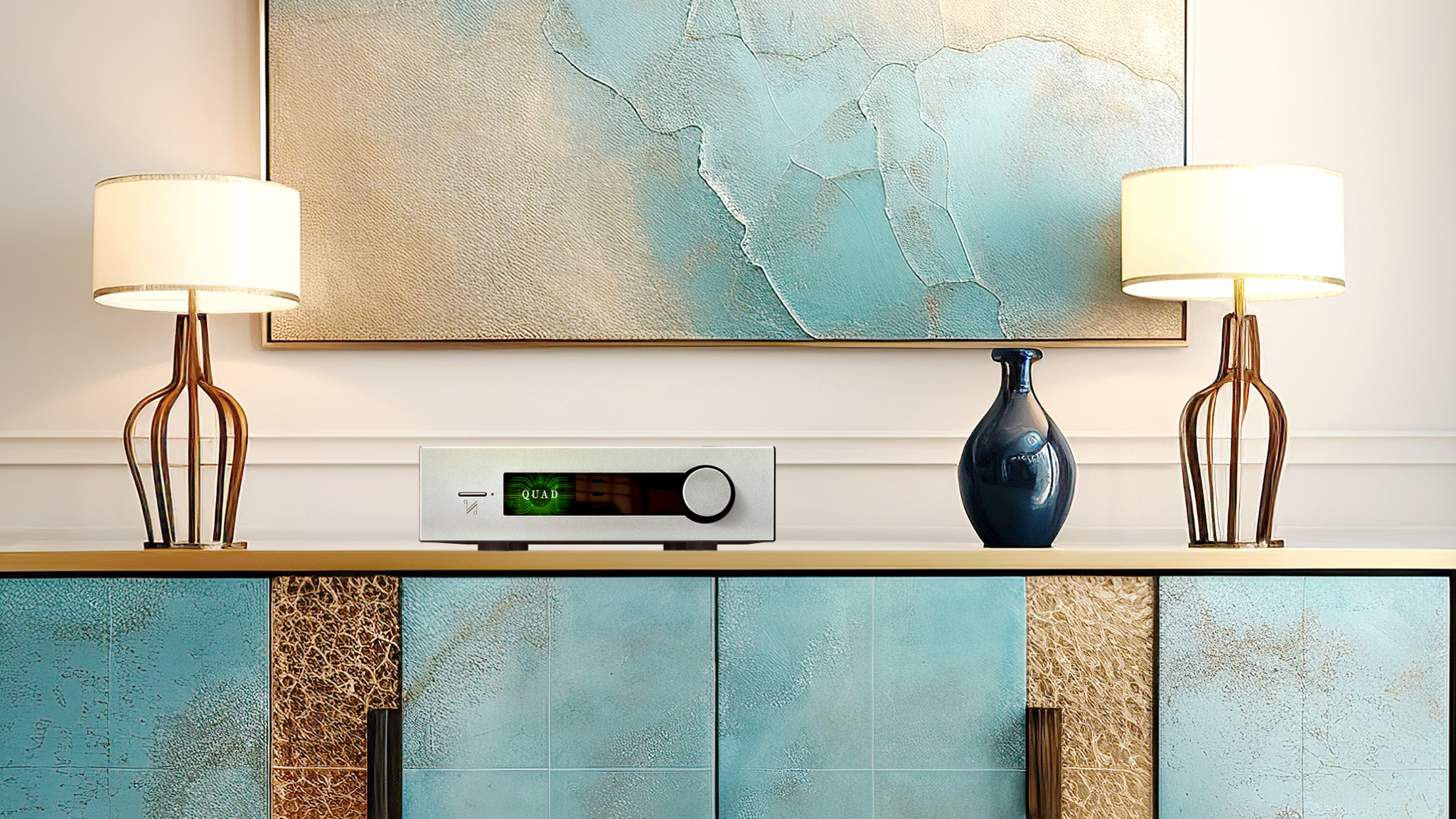 The Quad Platina Integrated amplifier on top of a blue and beige unit between two nice lamps