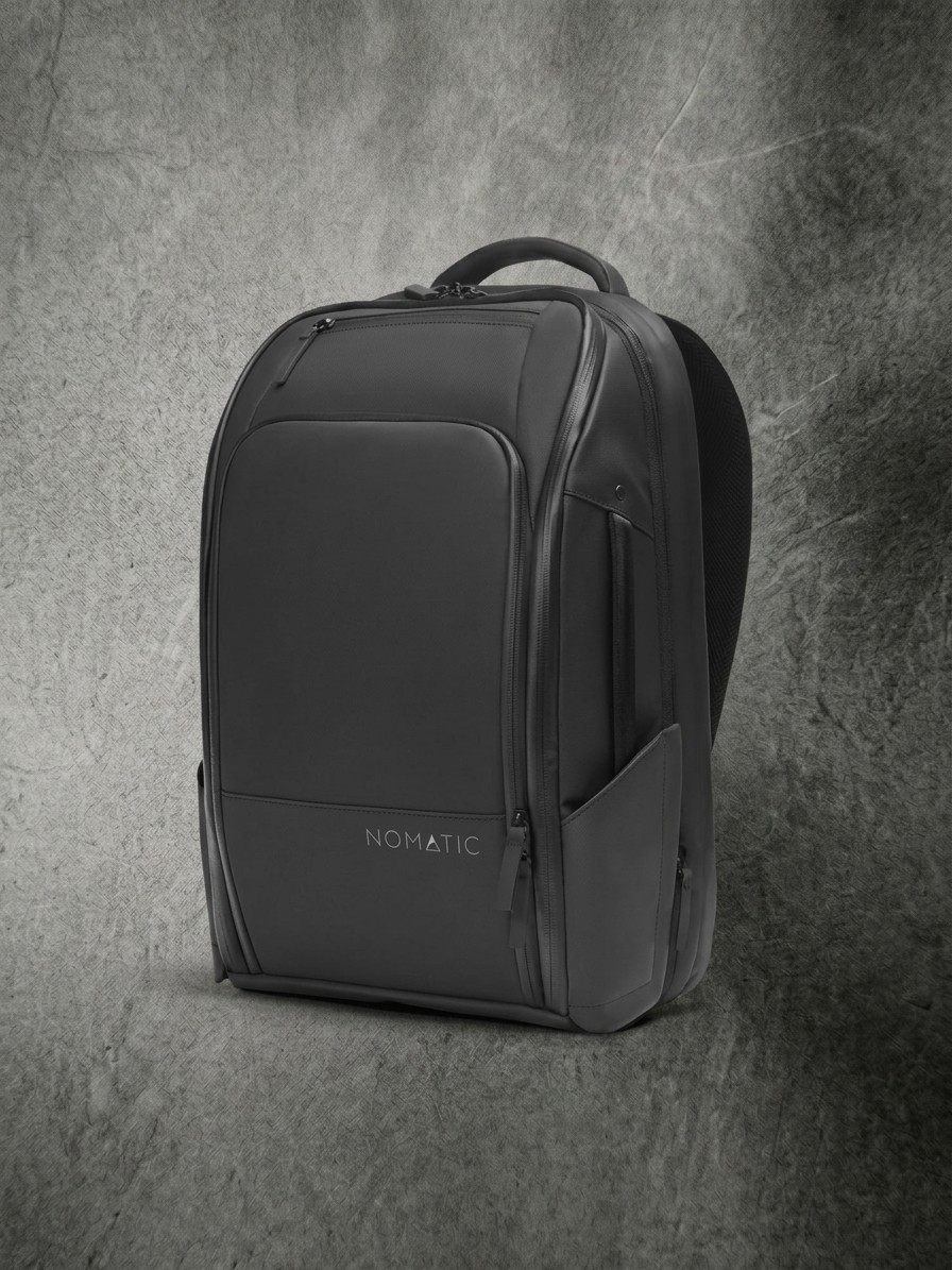 Luxury home office gear on a textured slate grey background