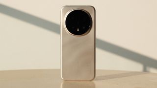 Honor Magic 8 Pro smartphone on a table in the sun