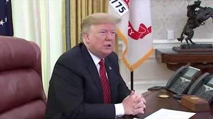 Trump sits in the Oval Office during government shutdown