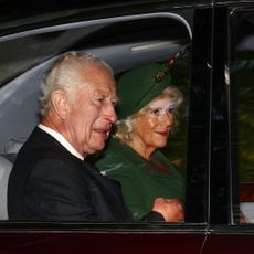 King Charles III and Queen Camilla arrive by car at Crathie Kirk to attend the church service on September 08, 2024 in Crathie, Aberdeenshire. This Sunday marks the second anniversary of the death of the UK's longest reigning monarch, Queen Elizabeth II.