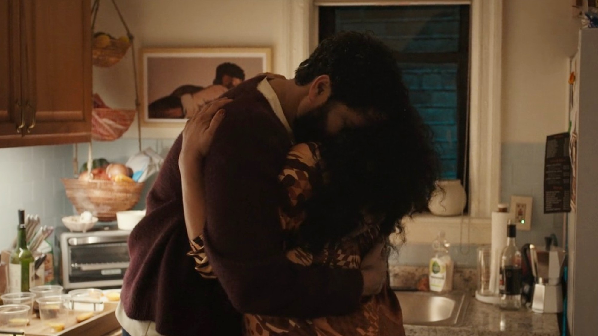 Michelle Buteau and Marouane Zotti hugging in Survival of the Thickest.