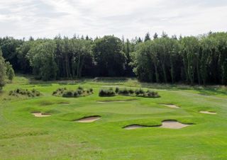 A magnificent seven bunkers protect the twelfth green