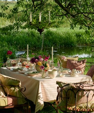 Garden party ideas with garden table and benches with cushions