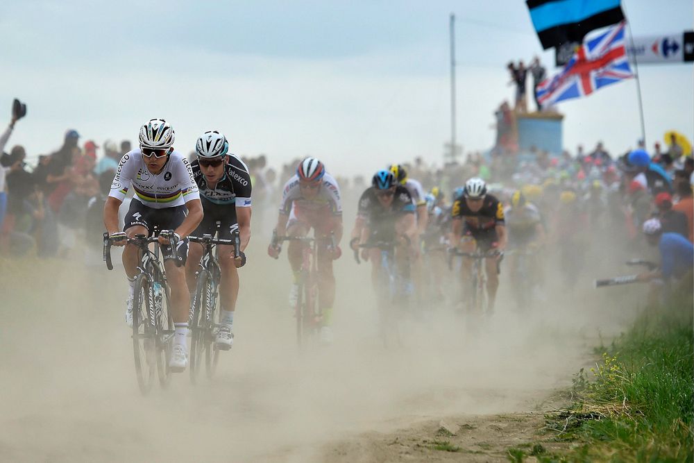 Etixx-QuickStep push the pace over the cobbles.