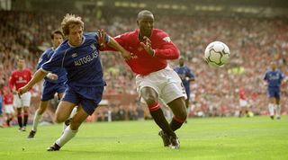 Gianfranco Zola and Andy Cole fight for a ball during a 3-3 draw between Chelsea and Manchester United in 2000.