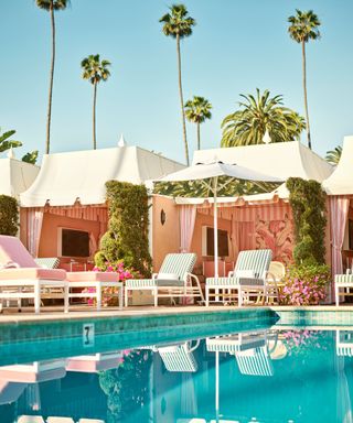 Pink pool huts, sunbeds