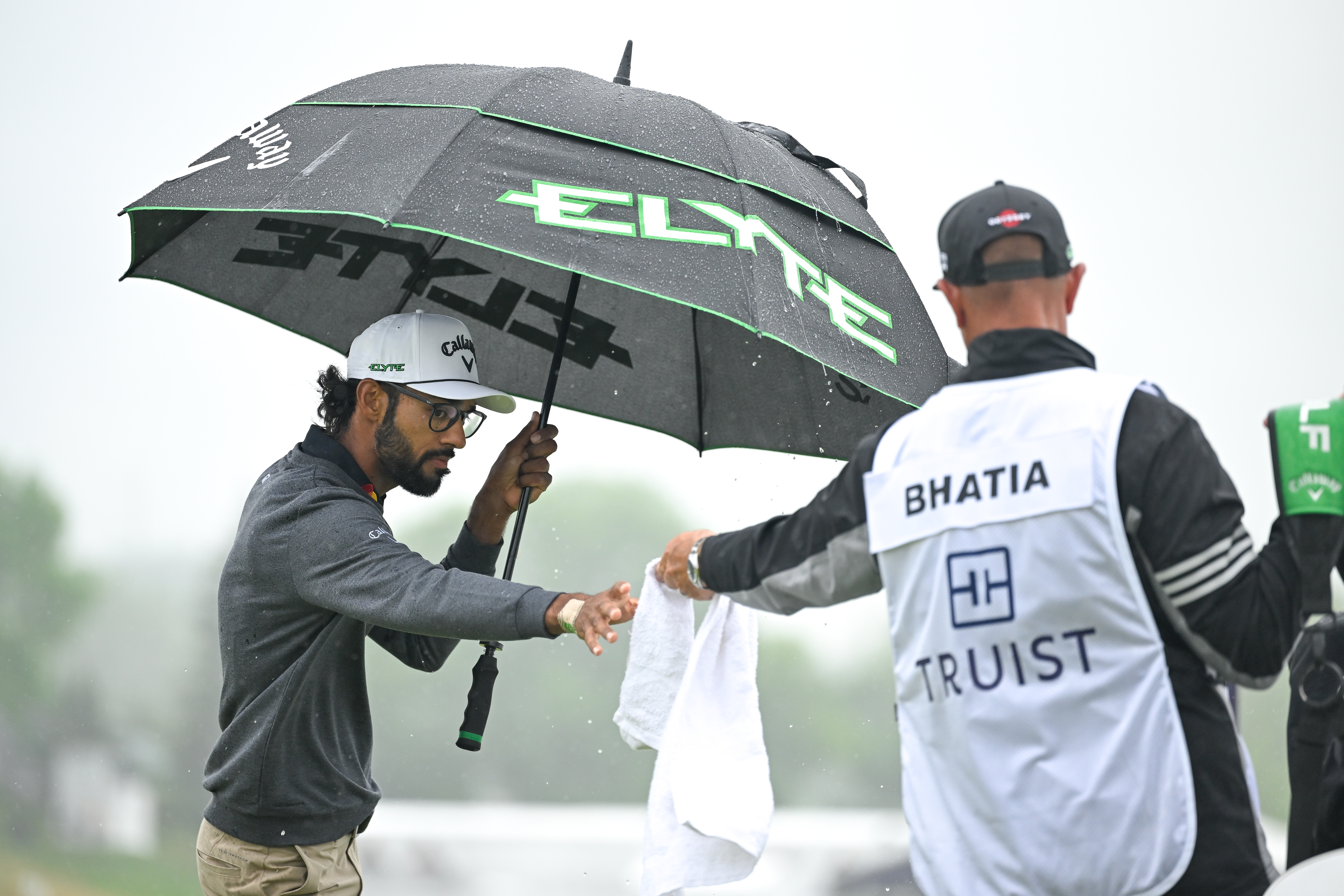 Golf towel being used in the rain