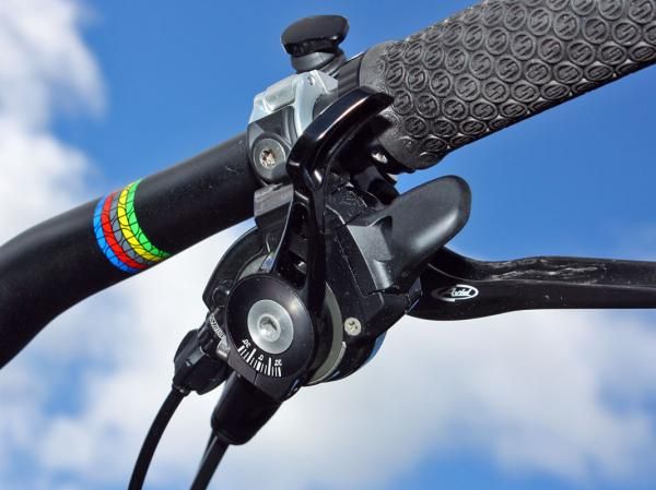 The previous X.0 shifter's extruded aluminum pull lever is now a forged bit, making it stronger and less brittle, plus the edges are slightly softened to make it easier on your knees in the event of contact.