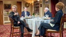 The Holy Rosenbergs family sitting around a dinner table
