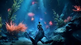 A shirtless man rides a big fish underwater