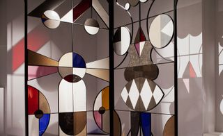 Graphic geometric panels set into the steel-frame walls