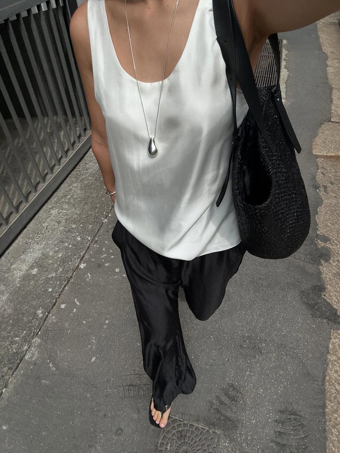 Selena Mual wearing silk pants