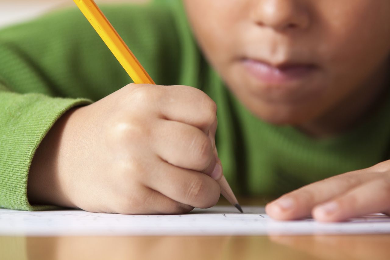 Boy doing homework.