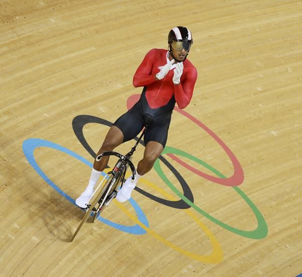 Njisane Nicholas Phillip (Trinidad and Tobago) celebrates his 1/4 final round victory over Russia's Denis Dmitriev.