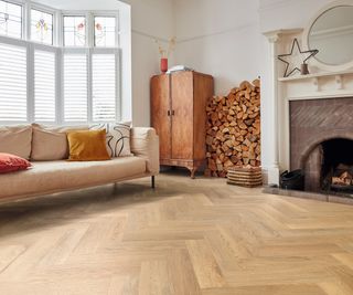 wooden oak effect herringbone style luxury vinyl flooring in living room