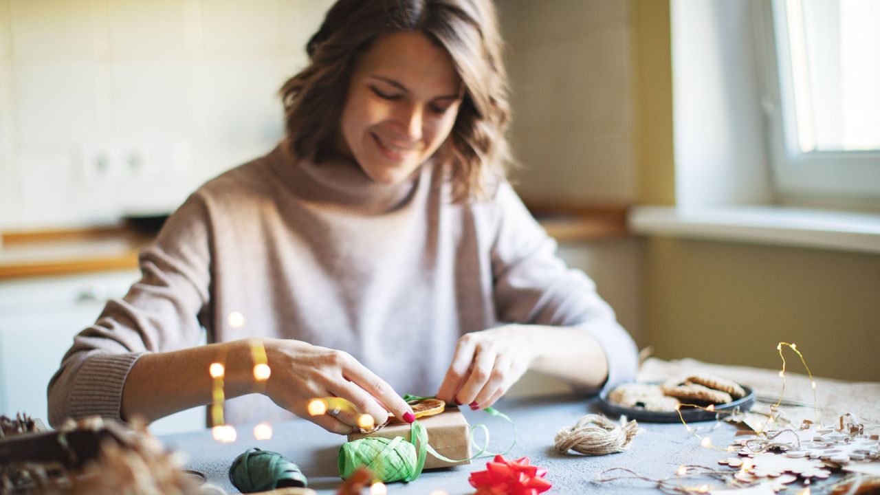 Woman Wrapping Gift