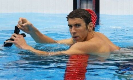 Michael Phelps looks on after competing in heat four of the Men&amp;#039;s 400-meter individual medley on July 28: Phelps may be struggling because his training regimen since the last Olympic games ha