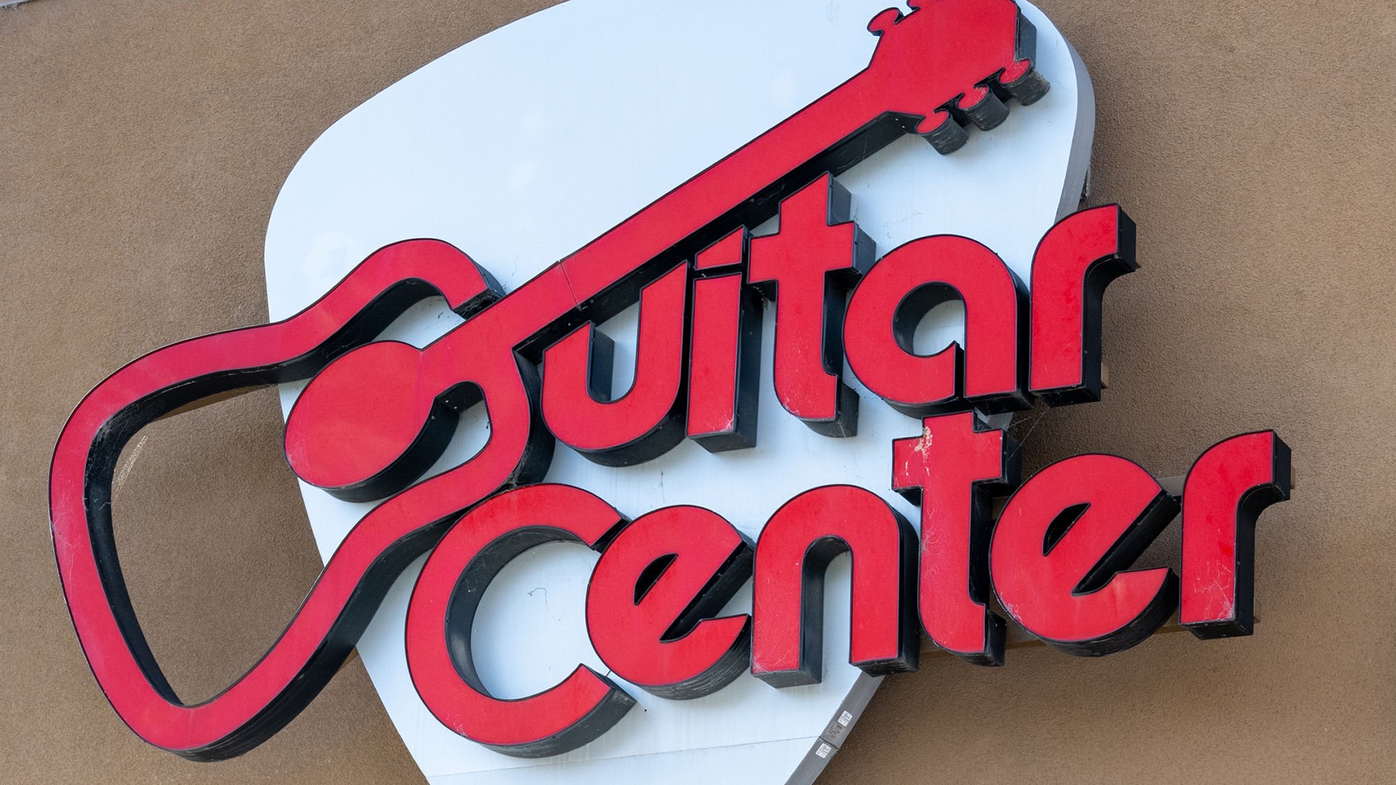 Facade of Guitar Center store in Emeryville, California with logo visible, November 12, 2025