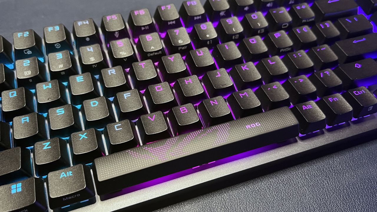close up of the keys on black Asus gaming keyboard with RGB lighting