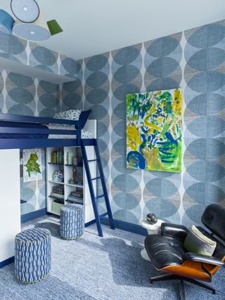 A kids' blue-themed bedroom with a bunk bed