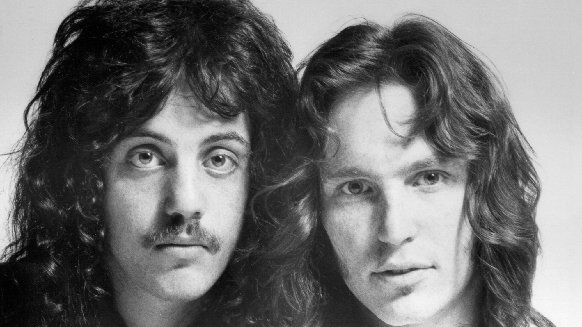Singer Billy Joel and drummer Jon Small pose for a portrait in 1970