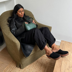 Monikh in black clogs