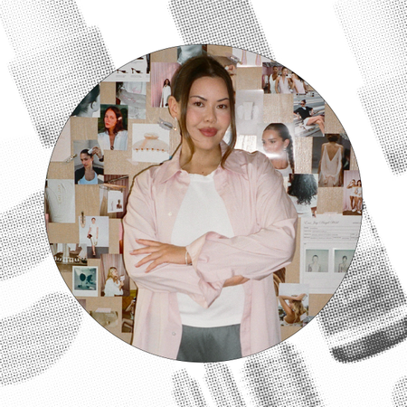 Photo of Julianne Goldmark in front of a bulletin board