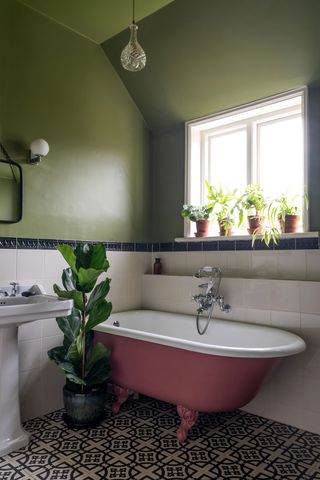 Pink and green bathroom in colorful Edwardian beachside retreat in Kent