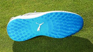 The blue spikeless outsole of the Puma Ignite Elevate