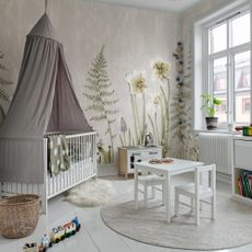 Rebel Walls wall mural with cot and canopy