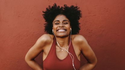 How long does it take to build muscle for females? A woman smiling
