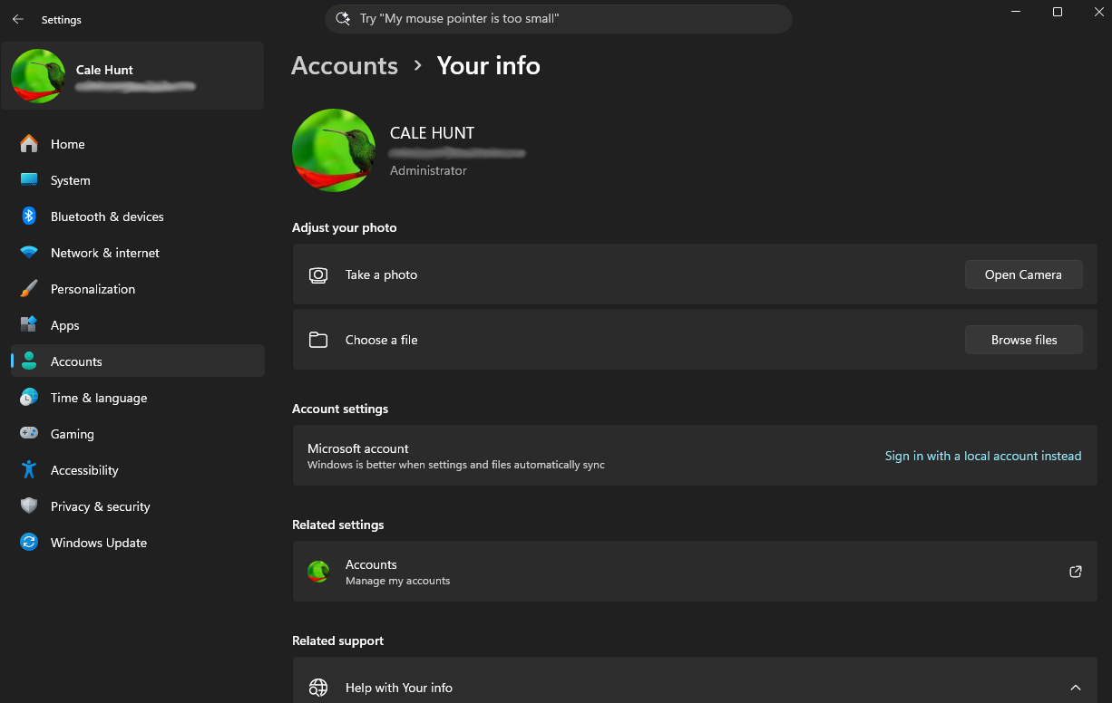 A screenshot of the Windows Accounts settings showing the profile of "Cale Hunt" with an administrator designation, options to adjust a photo, and a sidebar menu for various system settings.
