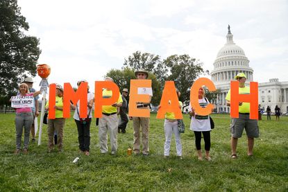Supporters of impeachment hold a rally in Washington, D.C.