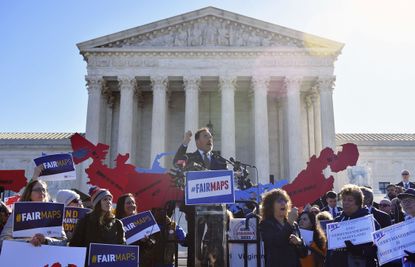 Arnold Schwarzenegger speaks during a rally to coincide with the Supreme Court hearings on redistricting.