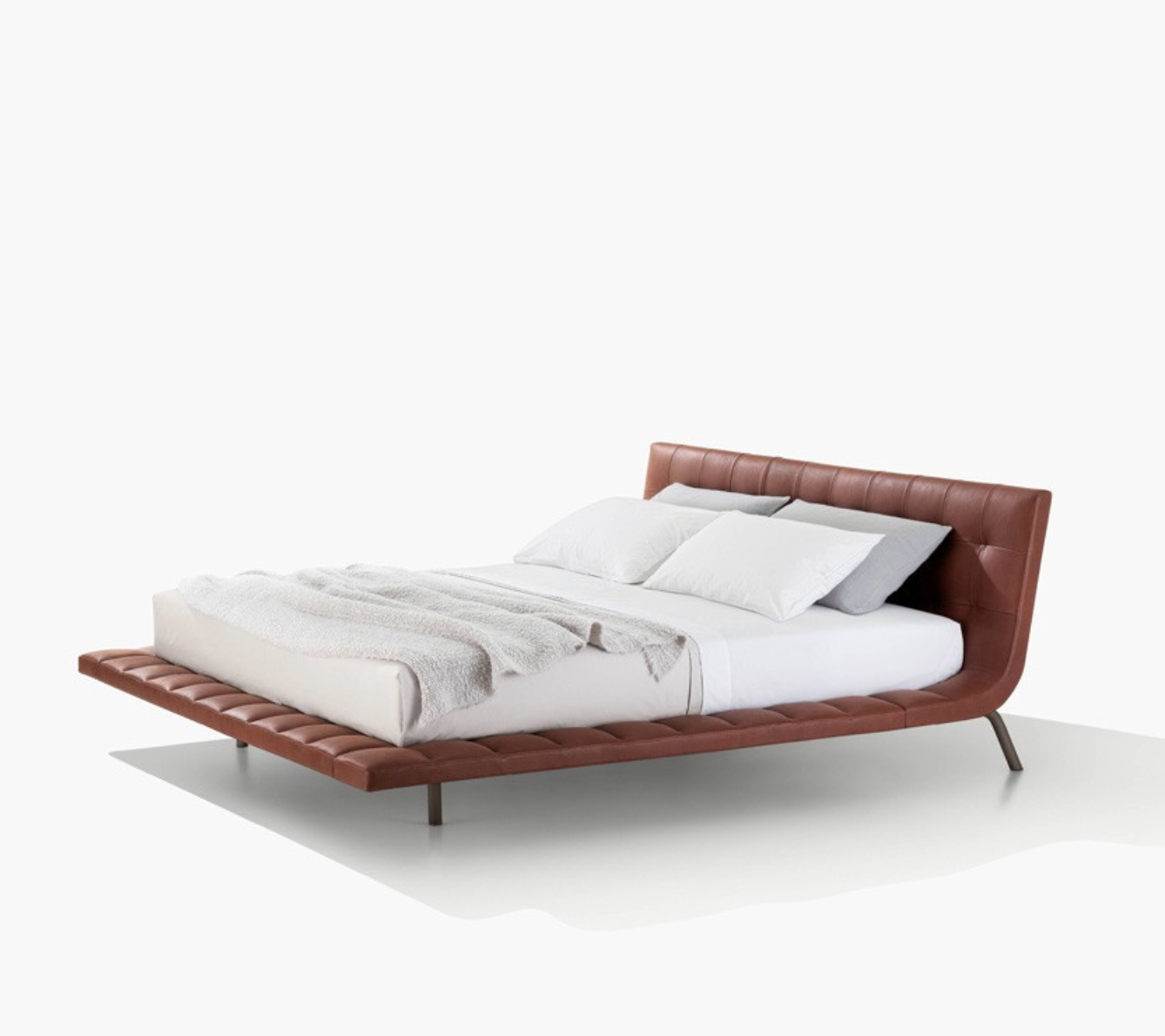 brown leather bed with short, slim legs