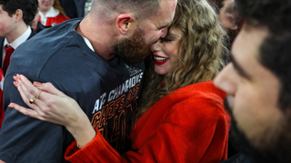 Travis Kelce #87 of the Kansas City Chiefs (left) celebrates with Taylor Swift after defeating the Baltimore Ravens in the AFC Championship Game at M&T Bank Stadium on January 28, 2024 in Baltimore, Maryland.