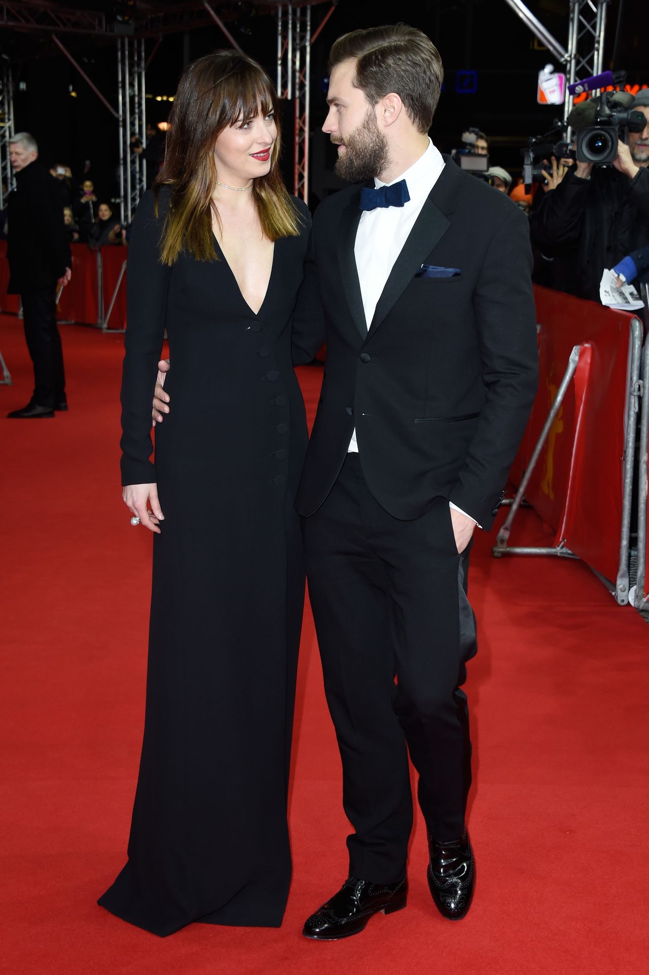 Dakota Johnson and actor Jamie Dornan attend the 'Fifty Shades of Grey' premiere during the 65th Berlinale International Film Festival at Zoo Palast on February 11, 2015 in Berlin, Germany.