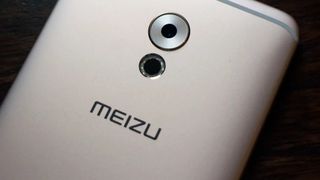 Meizu logo on the back of a phone