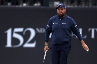 Shane Lowry walks off the green