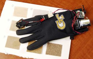 Georgia Tech researchers have developed a glove with a vibrating fingertip that improves tactile sensitivity and motor performance. The device uses an actuator made of a stack of lead zirconate titanate layers to generate high-frequency vibration to the side of the fingertip.