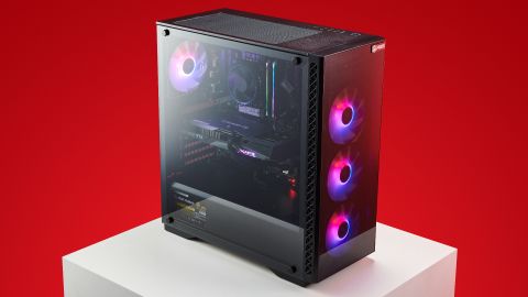 The ABS gaming PC three quarter view on red.